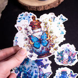 Butterfly Potions Handmade Holographic Vinyl Sticker Set of 8, perfect magical witchy bullet journal gift. In this set, you'll discover 8 potions, each infused with delicate butterfly elements, casting a spell of whimsy and magic.