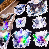 Moths and Butterflies Fantasy Holographic sticker set of 8 pieces, with natural witchy elements. Step into a realm of enchantment with our meticulously handcrafted set of 8 stickers, featuring ethereal moths and butterflies in a dark fantasy style.