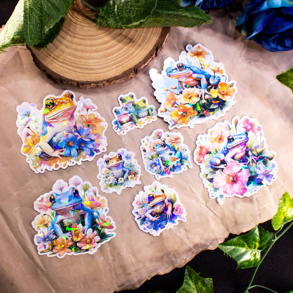 Pastel Frogs Holographic Handmade Sticker Set of 8, natural flower elements and cute style. Dive into a world of whimsy with our handcrafted 