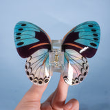 Sylva butterfly hair clip in light blue and perlescent white, fantasy fun hair accessory
