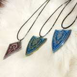 Horde and Alliance from World of Warcraft necklace pendant in resin and aluminum powder