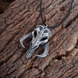 Mythosaur skull necklace in resin and aluminum powder from The Mandalorian