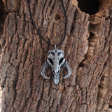Mythosaur skull necklace in resin and aluminum powder from The Mandalorian