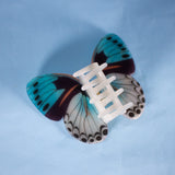 Sylva butterfly hair clip in light blue and perlescent white, fantasy fun hair accessory 