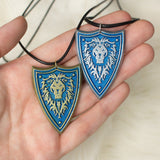 Horde and Alliance from World of Warcraft necklace pendant in resin and aluminum powder 