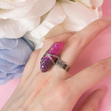 Losille ring with adjustable metallic base and resin crystal