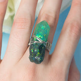 Malbeth ring with adjustable metallic base and resin crystal