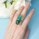 Malbeth ring with adjustable metallic base and resin crystal