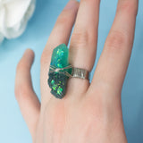 Malbeth ring with adjustable metallic base and resin crystal