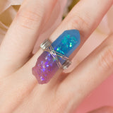 Rinie ring with adjustable metallic base and purple resin crystal 