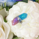 Rinie ring with adjustable metallic base and purple resin crystal 