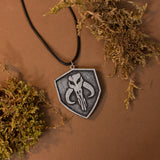 Star Wars The Mandalorian silver resin necklace, pin or keyring pendant mythosaurus black rope 